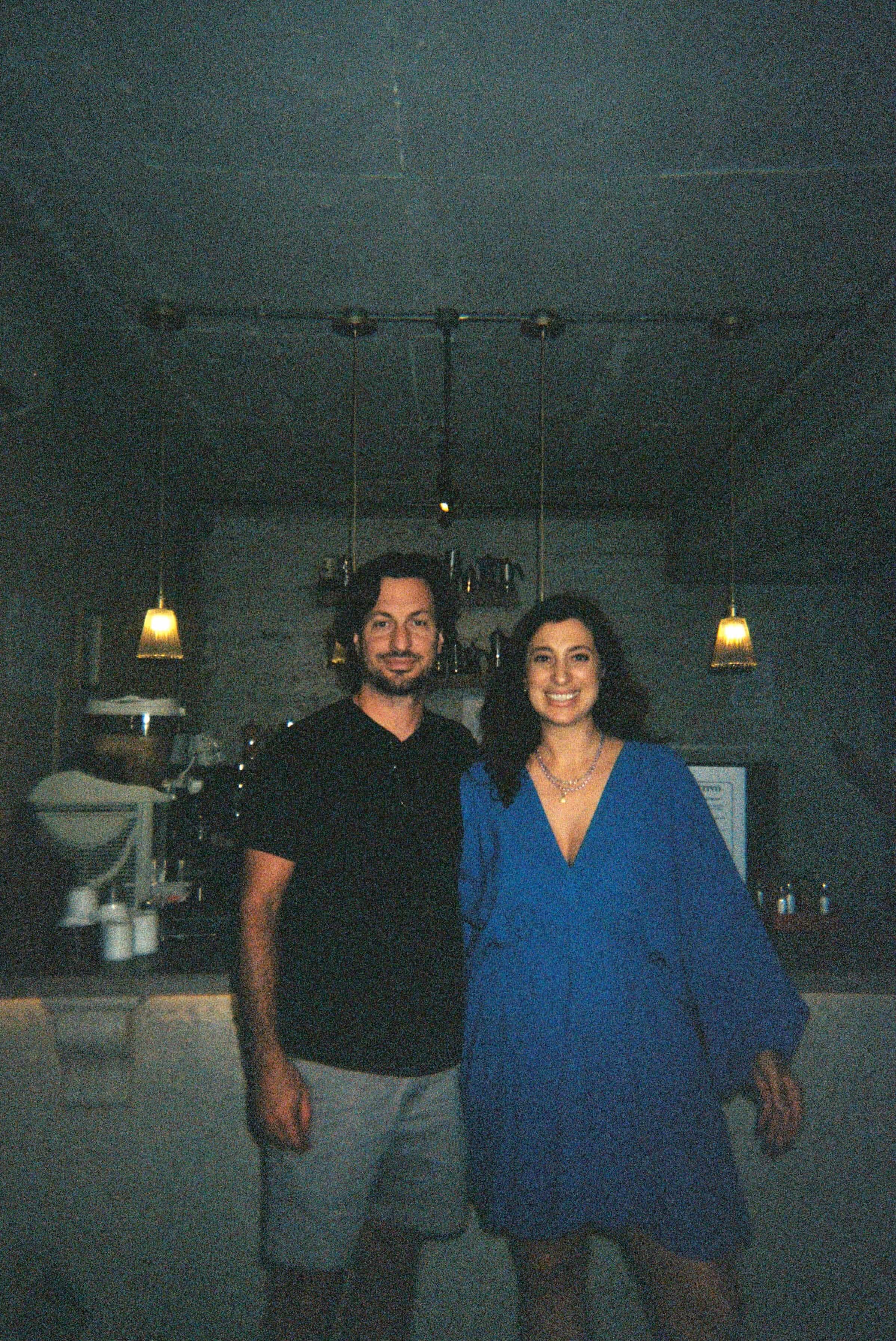 Dani and Chiara Turilli in a warm, dimly lit portrait inside Lello's Caffé