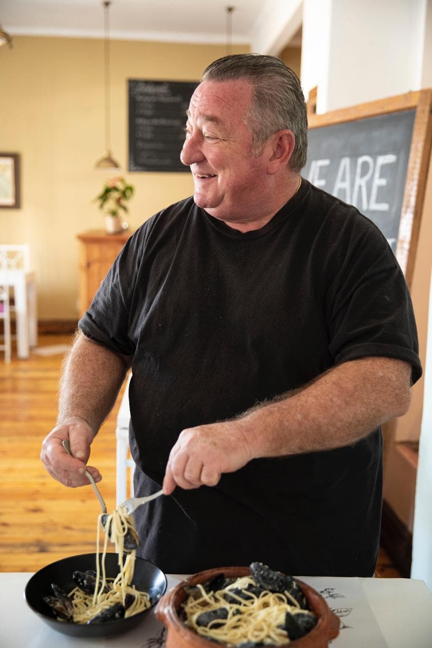 Ricky 'The Big Boss' Turilli serving truffle pasta at Scarpetta restaurant